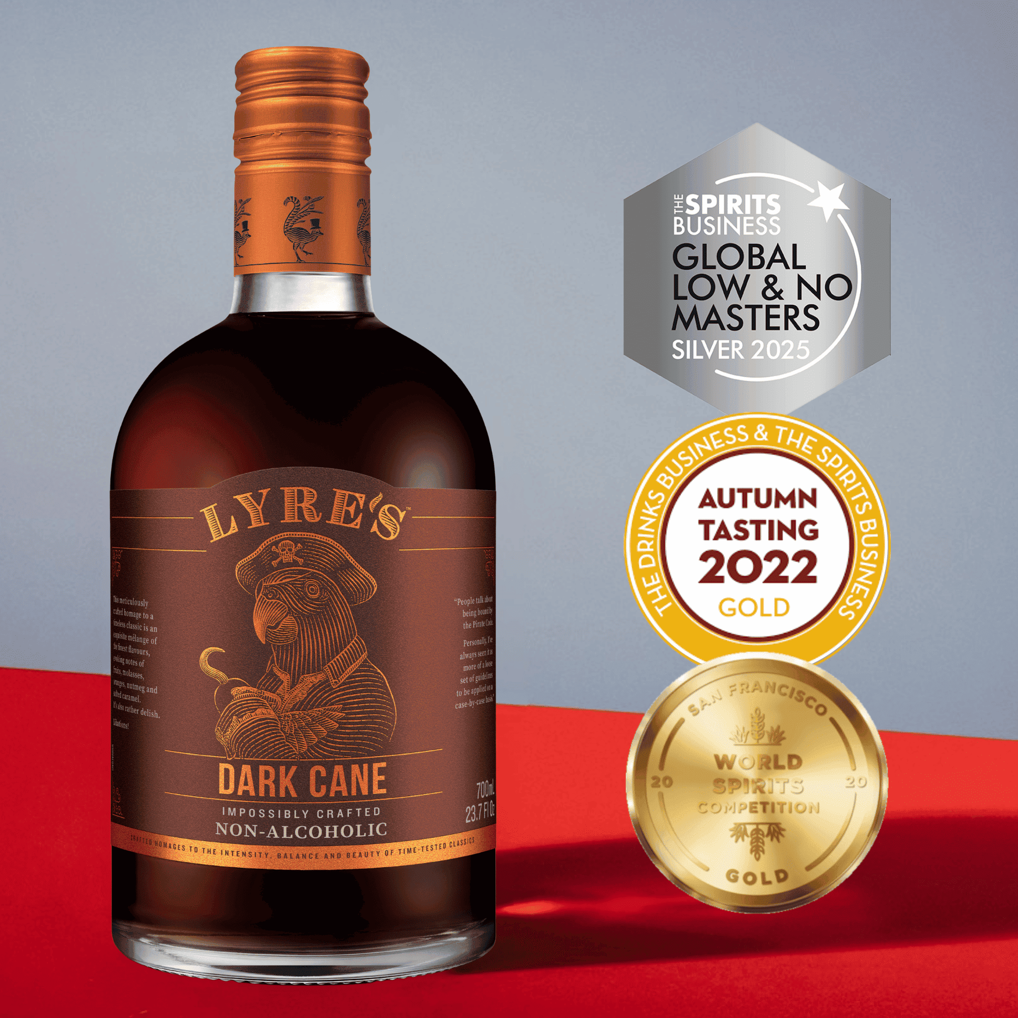 Bottle of Lyre's Dark Cane non-alcoholic with awards on a red and gray background
